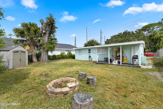 view of yard featuring a patio and a shed