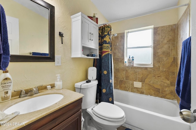 full bathroom featuring toilet, shower / tub combo, and vanity