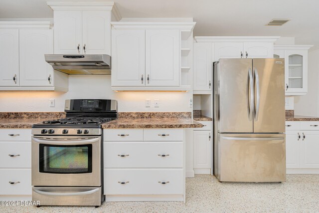 kitchen featuring white cabinets and appliances with stainless steel finishes