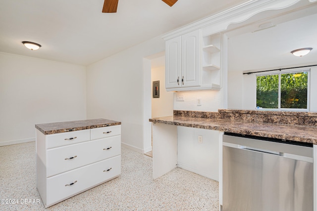 kitchen featuring white cabinetry, ceiling fan, and stainless steel dishwasher