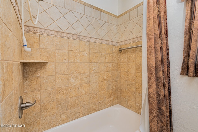 bathroom featuring shower / bathtub combination with curtain