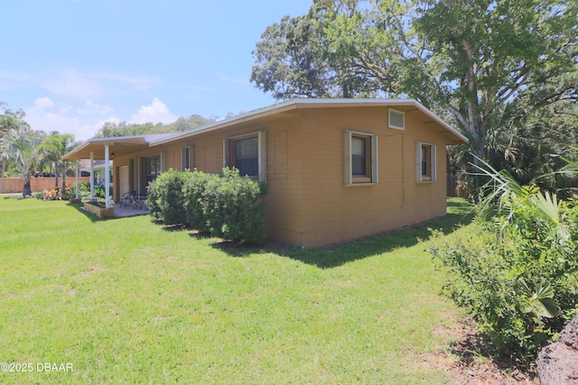 17 Putnam Ave, Ormond Beach, FL 32174 - view of side of property with a patio
