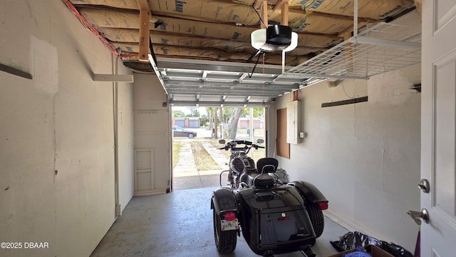 garage featuring a garage door opener
