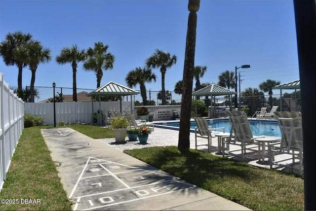 view of home's community featuring a gazebo and a pool