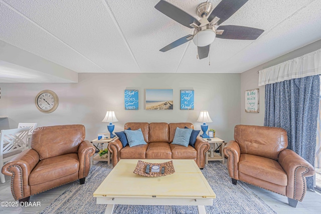 3800 S Atlantic Ave Unit 3030, Daytona Beach, FL 32118 - living area with ceiling fan, a textured ceiling, and wood finished floors
