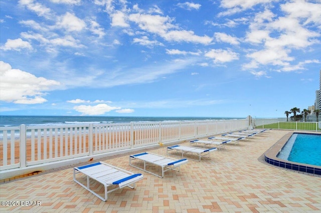 901 S Atlantic Ave Unit 202, Ormond Beach, FL 32176 - community pool featuring view of water and beach and a patio area