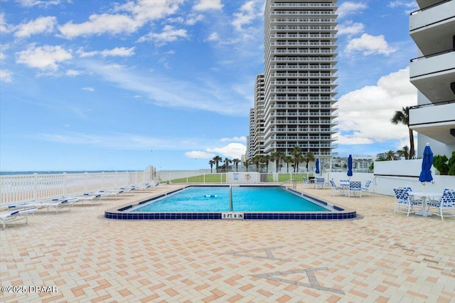 901 S Atlantic Ave Unit 202, Ormond Beach, FL 32176 - community pool with a patio area