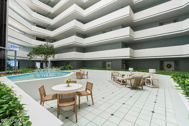 901 S Atlantic Ave Unit 202, Ormond Beach, FL 32176 - view of pool featuring a patio area