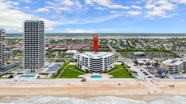 901 S Atlantic Ave Unit 202, Ormond Beach, FL 32176 - view of urban area featuring a pool area and expansive beach