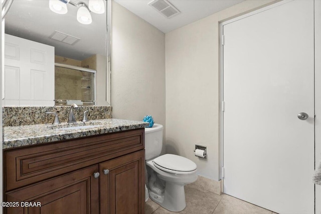 901 S Atlantic Ave Unit 202, Ormond Beach, FL 32176 - full bathroom with a shower stall, tile patterned flooring, and vanity