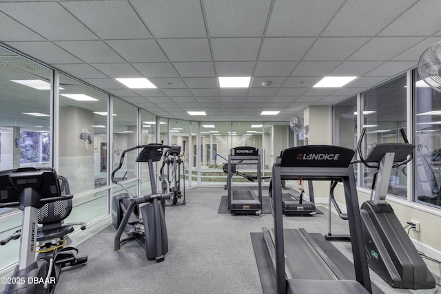 workout area featuring a paneled ceiling