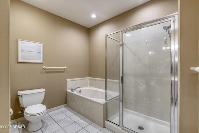 bathroom with tile patterned flooring, separate shower and tub, and toilet