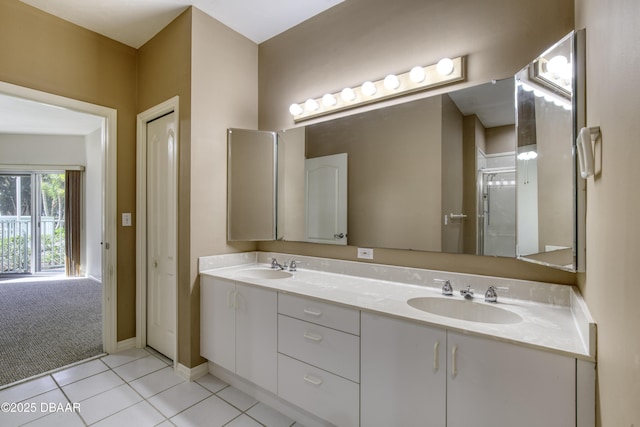 bathroom featuring vanity and tile patterned flooring