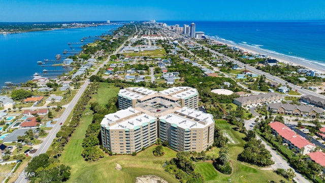 bird's eye view featuring a view of the beach and a water view