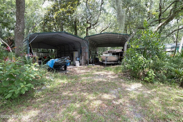 view of yard with a carport