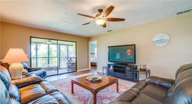17230 Terraverde Cir Unit 7, Fort Myers, FL 33908 - living room with ceiling fan, wood finished floors, and baseboards