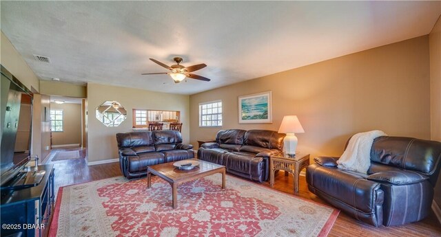 17230 Terraverde Cir Unit 7, Fort Myers, FL 33908 - living room with wood finished floors, a ceiling fan, and baseboards