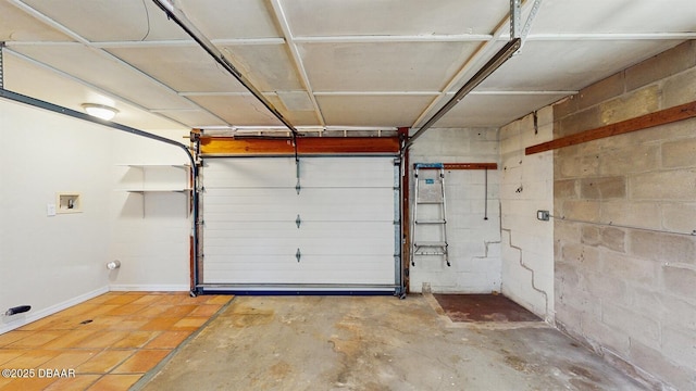 garage with concrete block wall