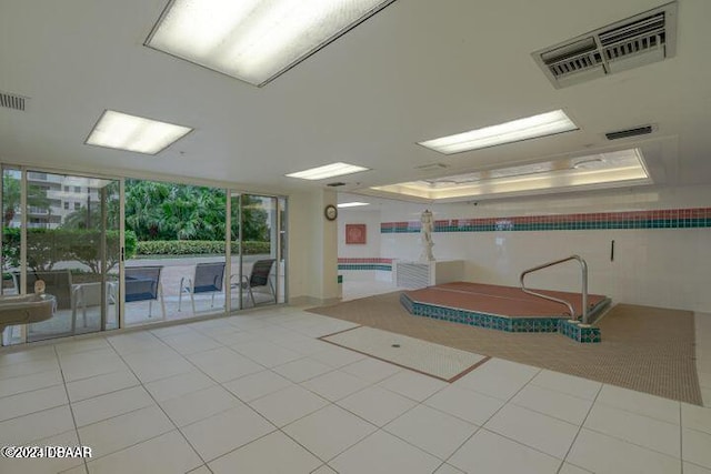 interior space featuring light tile patterned floors