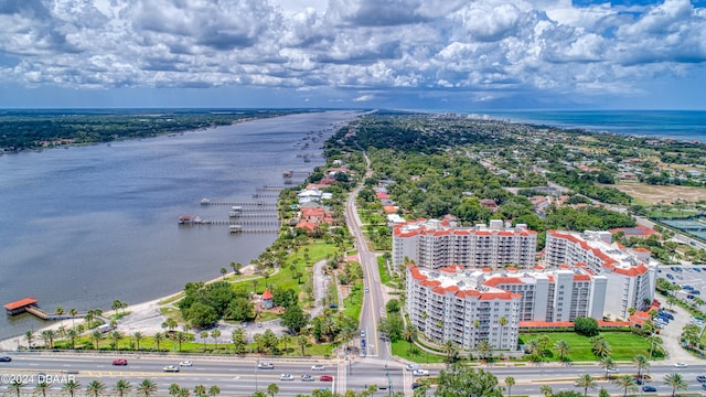 birds eye view of property featuring a water view