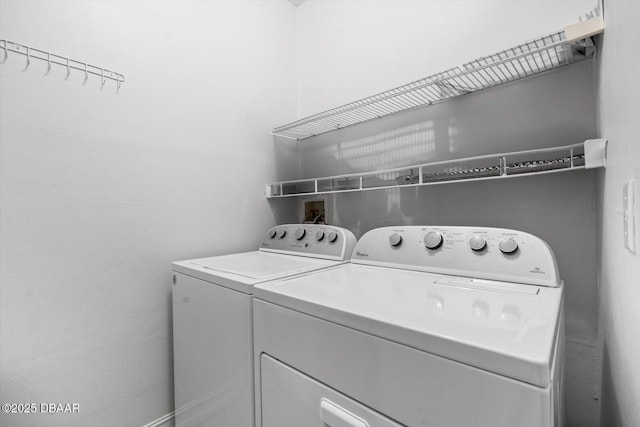 laundry area featuring separate washer and dryer