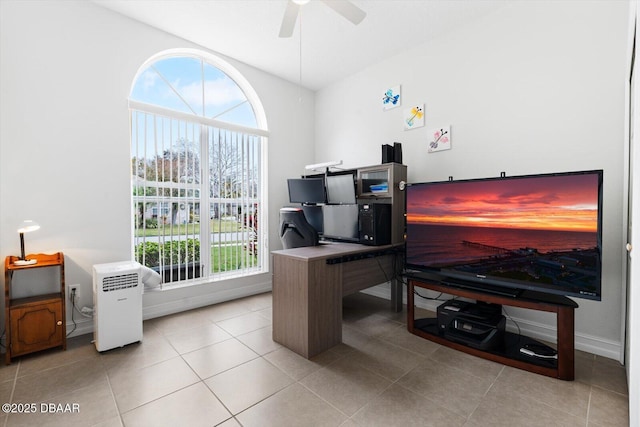 tiled office with a wealth of natural light and ceiling fan