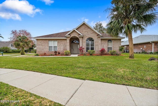 ranch-style house with a front yard