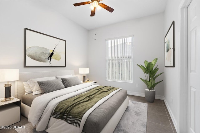 tiled bedroom with ceiling fan