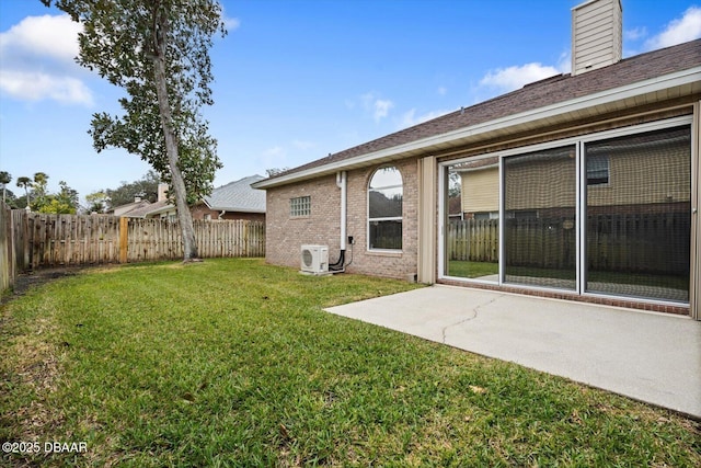 view of yard with a patio and ac unit