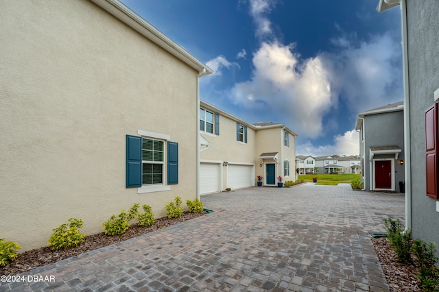 view of home's exterior featuring a garage