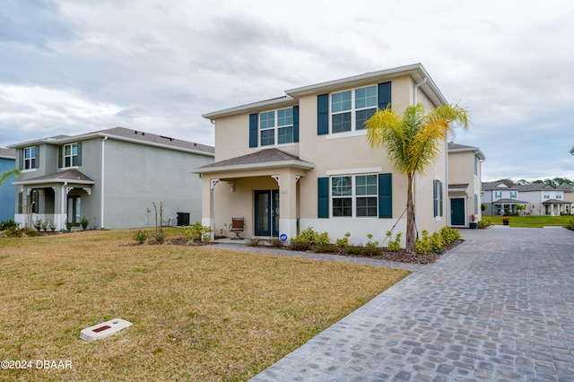 view of front of house with a front lawn