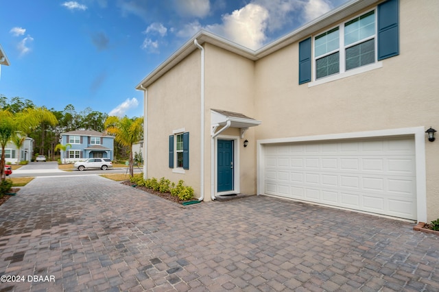 view of front of home featuring a garage