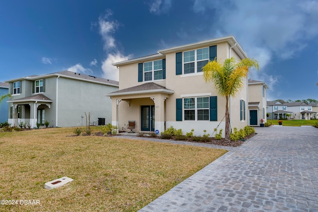 view of front facade featuring a front yard