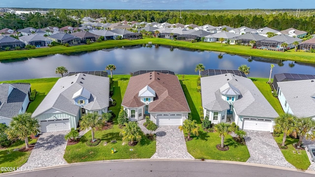 bird's eye view with a water view and a residential view