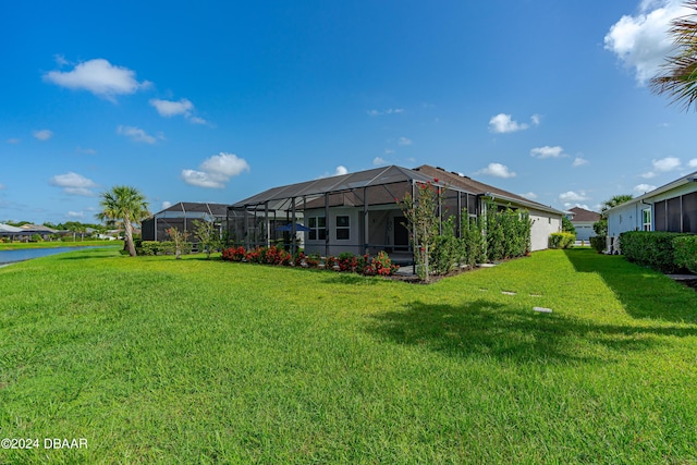 view of yard with a lanai