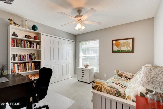 1245 Hampstead Ln, Ormond Beach, FL 32174 - carpeted office space featuring a ceiling fan and baseboards