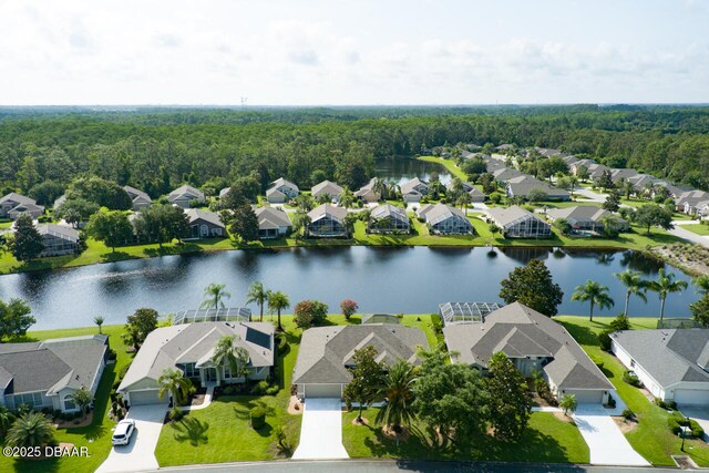1245 Hampstead Ln, Ormond Beach, FL 32174 - aerial view of residential area featuring a large body of water and a forest