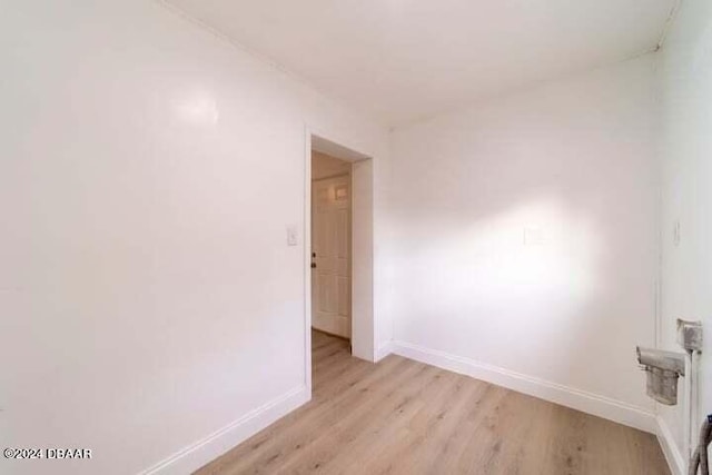 empty room with light wood-type flooring