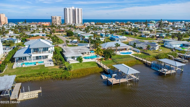 drone / aerial view featuring a water view