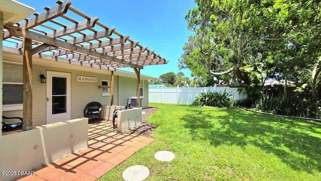 52 Palm Dr, Ormond Beach, FL 32176 - fenced backyard featuring a pergola and a patio