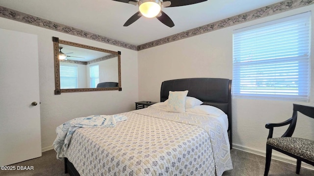 52 Palm Dr, Ormond Beach, FL 32176 - bedroom featuring carpet flooring, multiple windows, and ceiling fan
