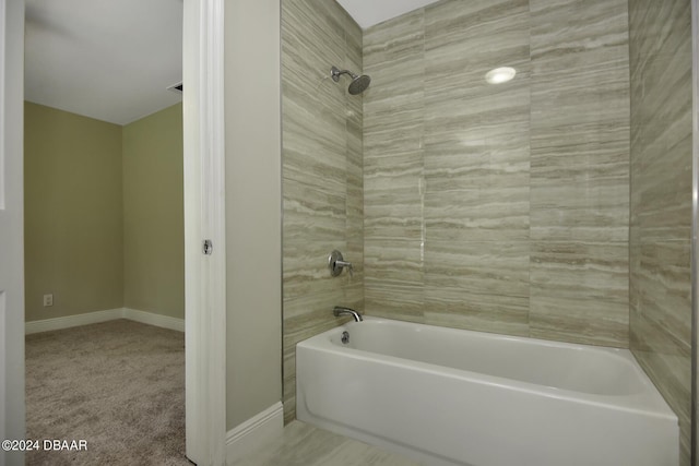 full bath with  shower combination and baseboards