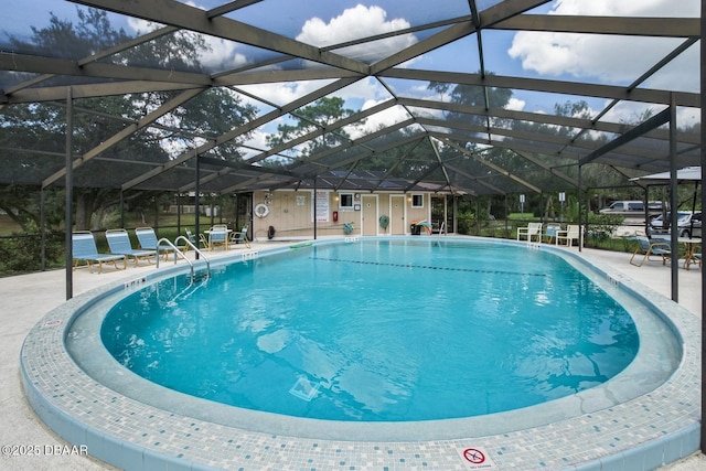 36 Summer Trees Rd, Port Orange, FL 32128 - community pool with a patio and glass enclosure