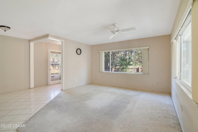 36 Summer Trees Rd, Port Orange, FL 32128 - carpeted spare room featuring a ceiling fan and tile patterned floors