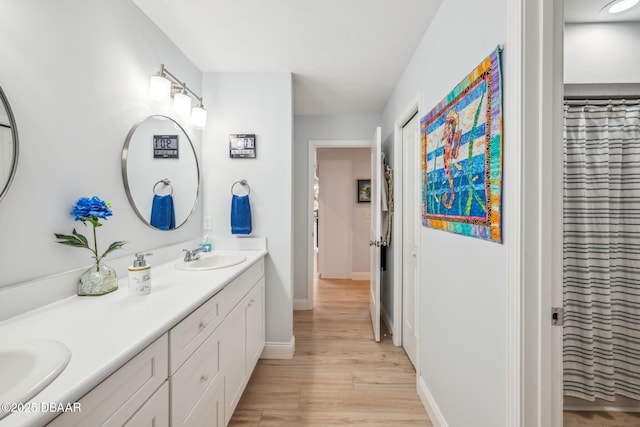 bathroom with vanity and a shower with curtain