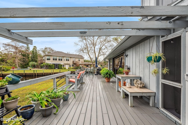 wooden deck featuring a pergola