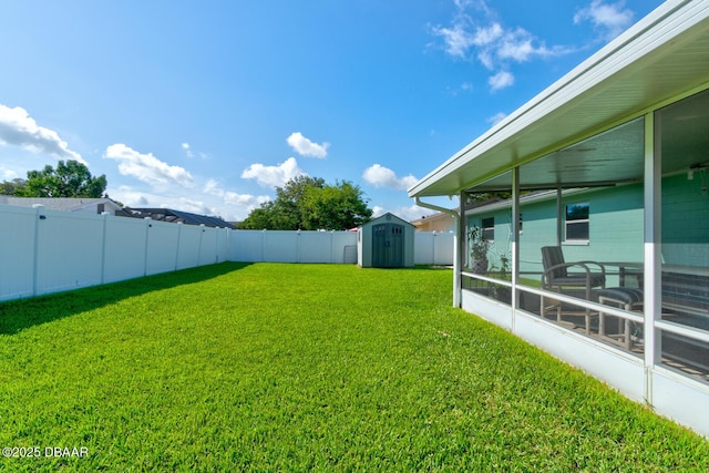 2917 Carriage Dr, South Daytona, FL 32119 - fenced backyard with a storage unit and a sunroom