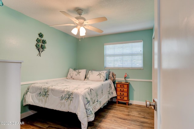 2917 Carriage Dr, South Daytona, FL 32119 - bedroom featuring wood finished floors and a ceiling fan