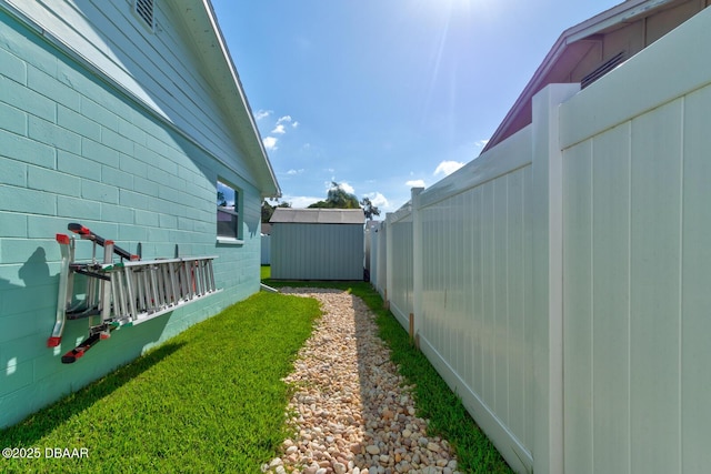 2917 Carriage Dr, South Daytona, FL 32119 - view of yard with a storage shed