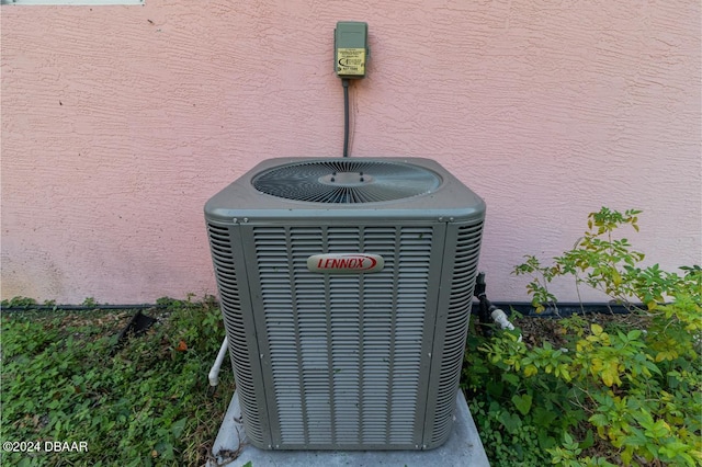 715 Unabelle Ave, Holly Hill, FL 32117 - exterior view of cooling unit and stucco siding
